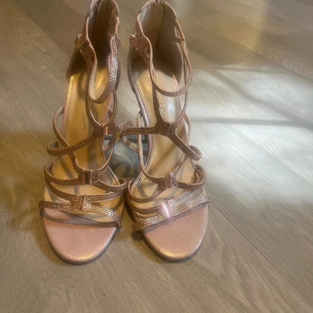 Betsy Johnson Rose gold strappy heels with rhinestones and blue bottom.